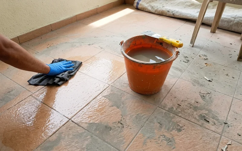 Wiping cement haze off new floor tiles