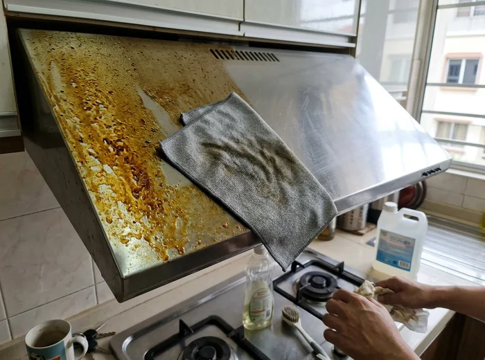 Kitchen range hood before and after degreasing
